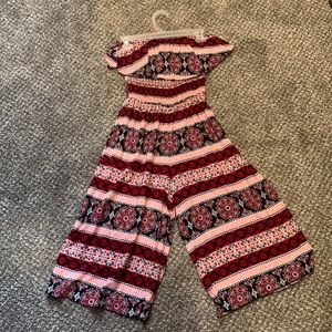 Tube top cropped romper. Red and black pattern with ruffle top. SIZE S.